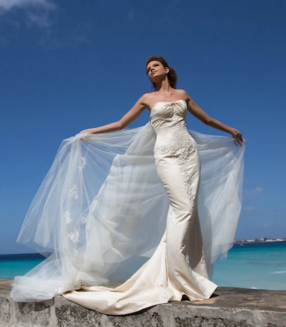 Thalia. A couture gown photographed in an ornate interior.