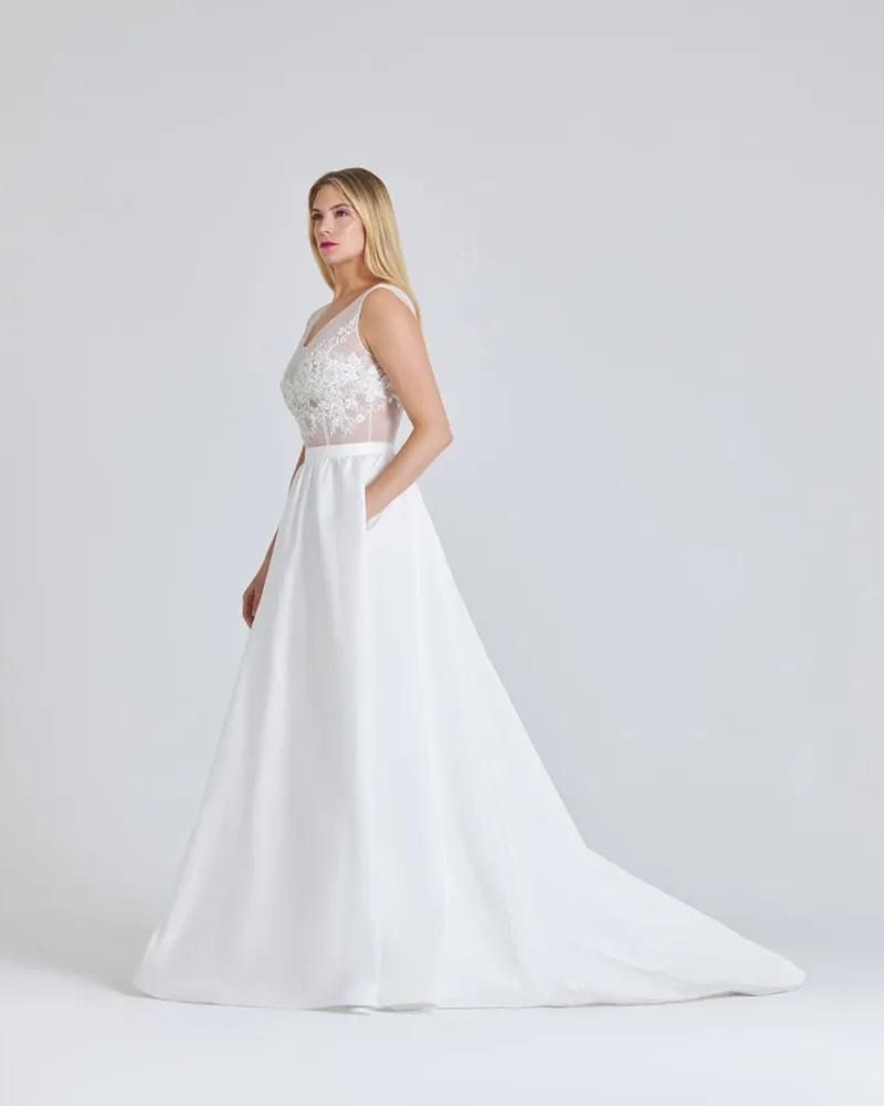 Ronke, side view showing the gathered skirt and side pocket.
